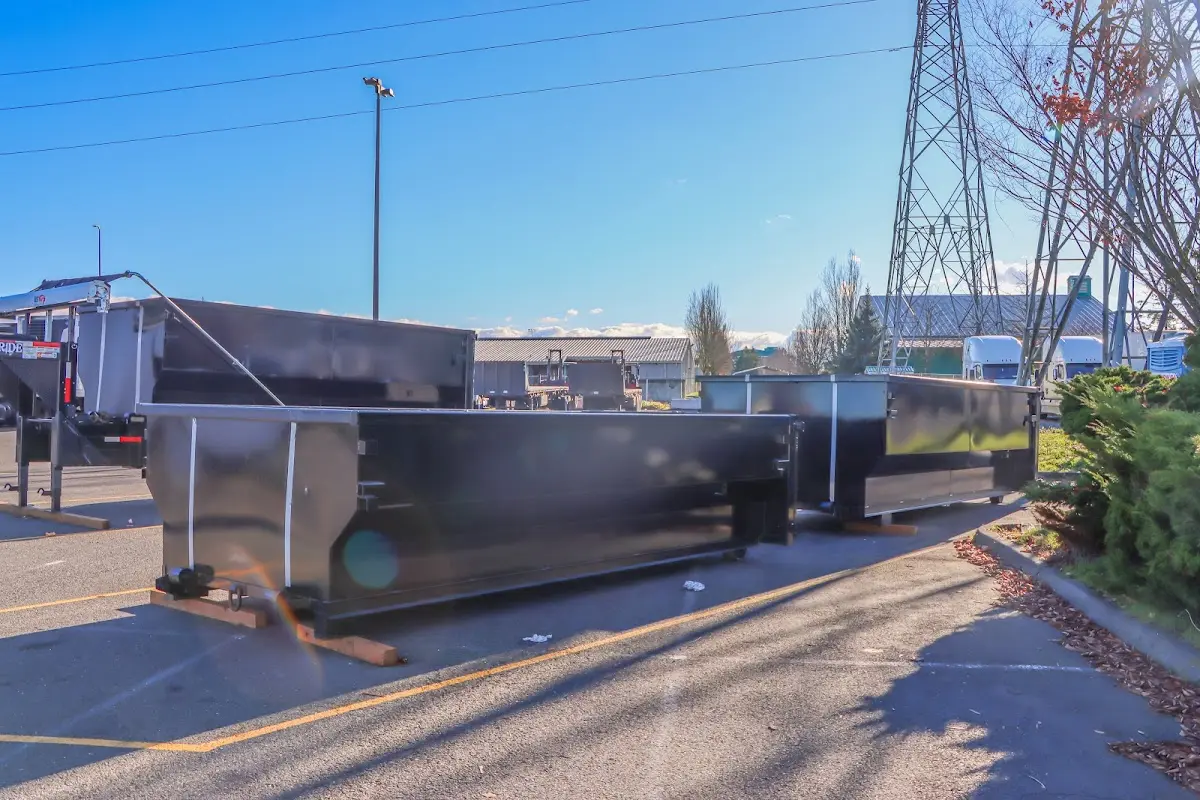 Roll-off dumpster ready for waste disposal at job site for Construction Dumpster Rental in Estes Park